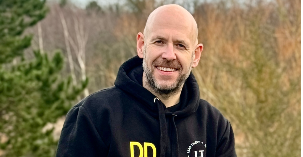 Image of David Davies smiling and looking into the camera